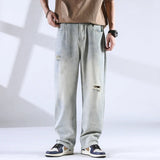 Nout | Verwassen jeans met scheurdetails en rechte pijpen