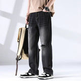Nout | Verwassen jeans met scheurdetails en rechte pijpen